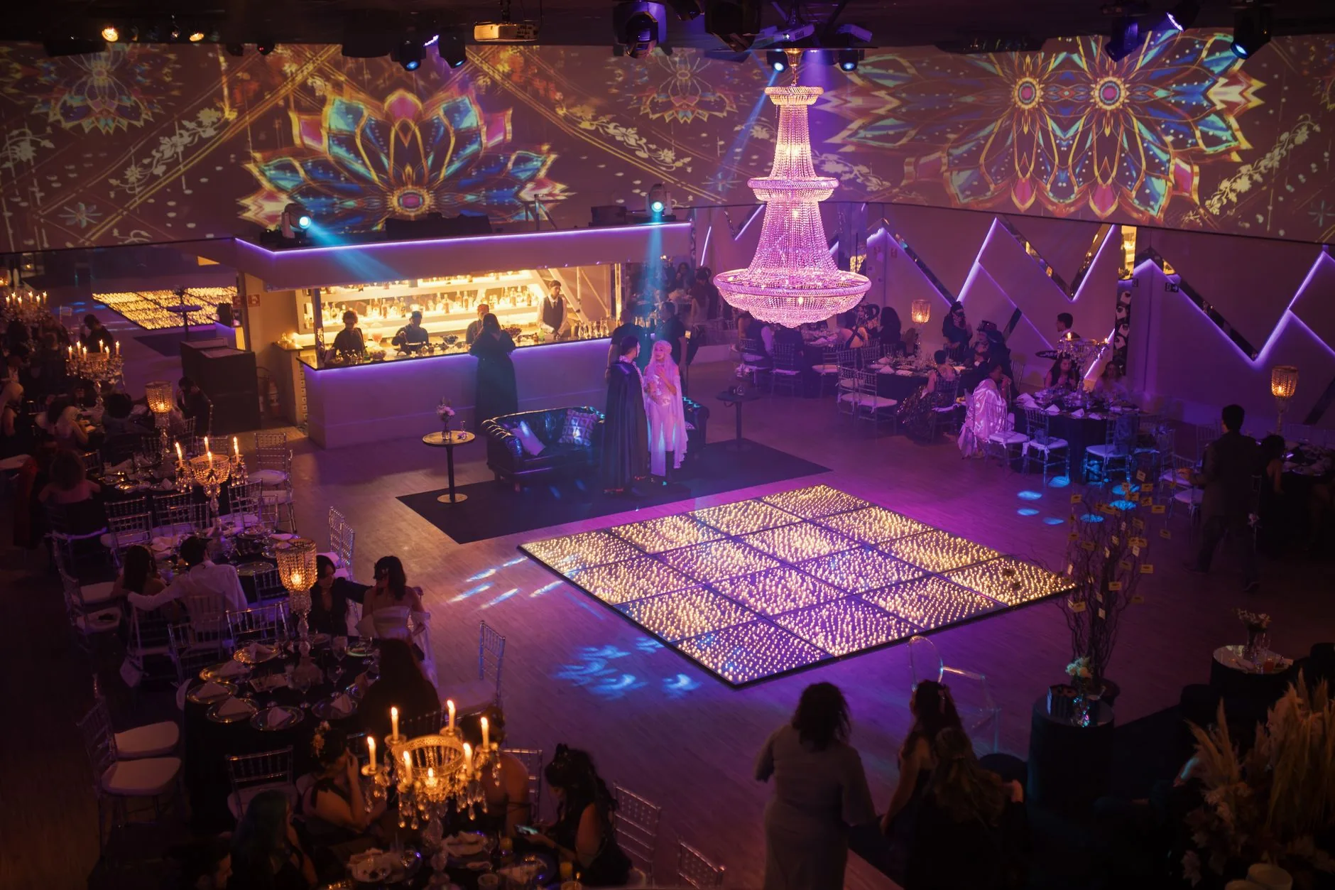 Elegant ballroom filled with lush floral arrangements, Adriana's Event Venue Floral Services.
