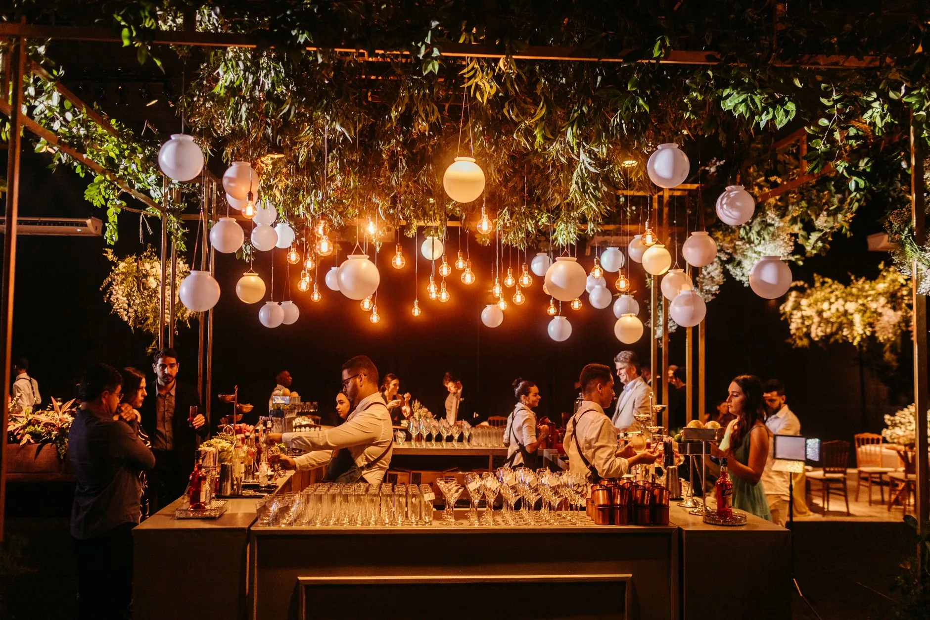 Grand ballroom with chandeliers, elegant decor, and spacious dance floor. Adrianna Hill Grand Ballroom Spaces & Capacity